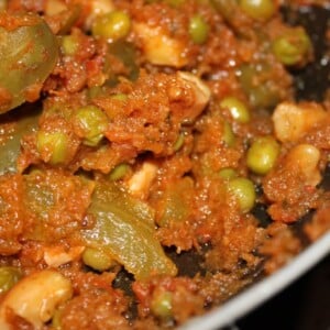 A close up of tomato cilantro curry