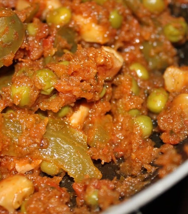 A close up of tomato cilantro curry