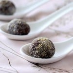 Gingerbread spiced Chocolate Nut butter truffles on white serving spoons