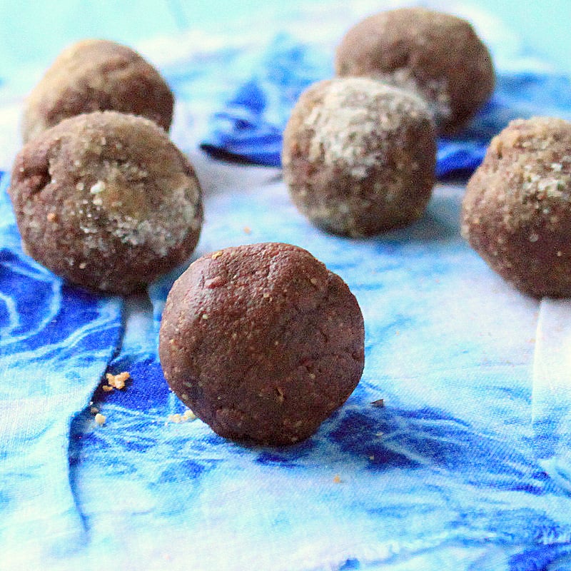 Gingerbread spiced Chocolate Nut butter truffles. Chocolate Nut butter spiced truffles rolled in Gingerbread spices. Easy Holiday treat. | VeganRicha.com #vegan #glutenfree #truffle