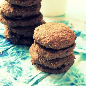 Chocolate whoopie pies stacked on a work surface