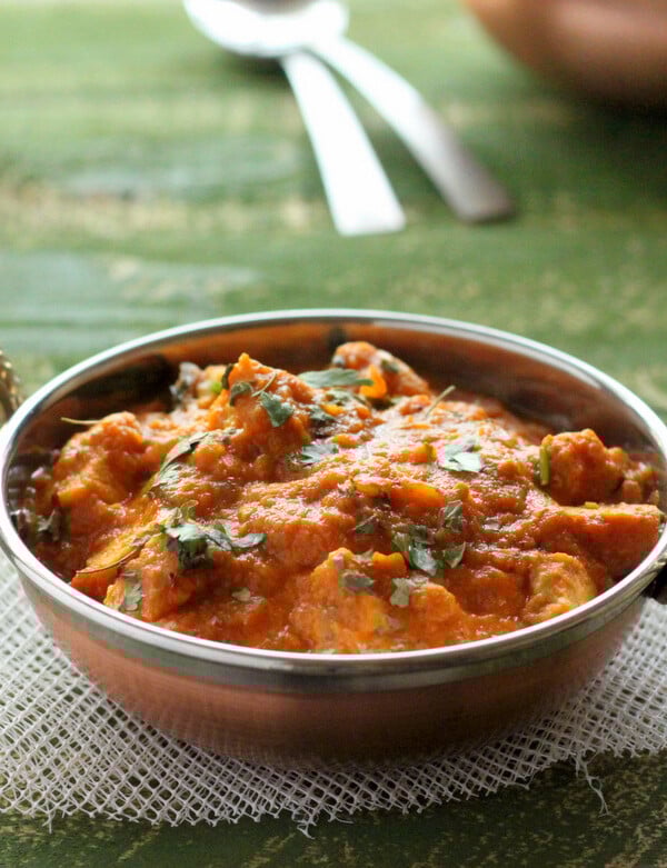 Tempeh tikka masala served in a metal dish