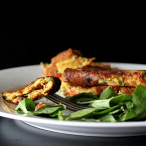 A chickpea flour omlette served with a side salad