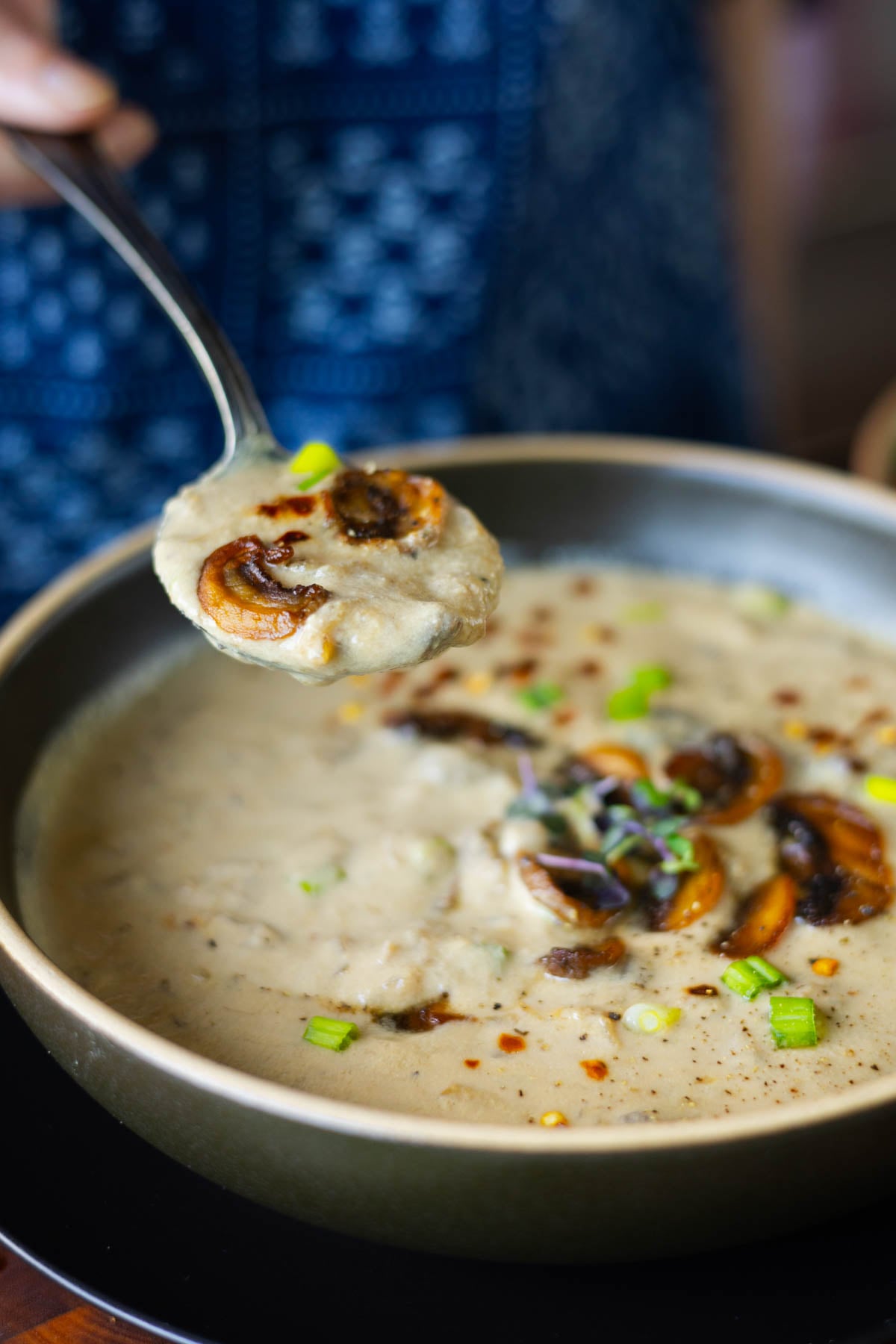 close-up of a bite of cream of mushroom soup
