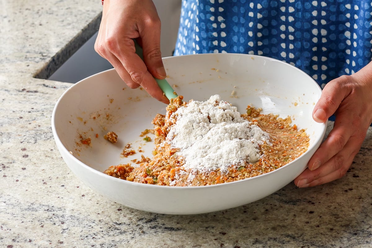 adding flour to the wet mixture