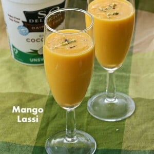 Vegan mango Lassi - Indian Mango Yogurt smoothie with ripe mango, non dairy yogurt and cardamom or saffron. Dairy-free, gluten-free. #vegan #glutenfree #veganricha