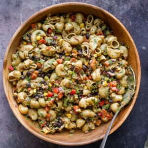 Southwestern pasta salad in a wooden bowl.