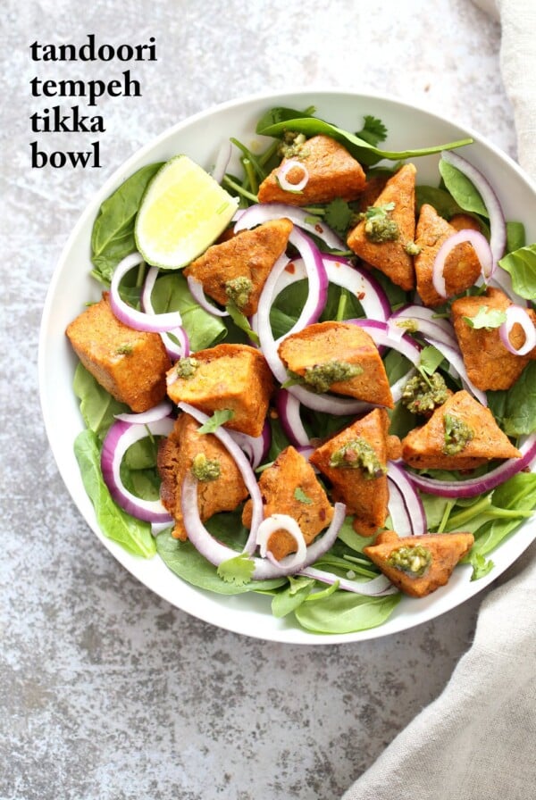 Tempeh Tandoori Tikka Bowl with Cilantro Mint Chutney. Tempeh marinated in Delicious and Flavorful Tandoori Marinade, then baked and served over greens, onions. #veganricha #Vegan #Glutenfree #Recipe. Use vegan meat subs for #soyfree | VeganRicha.com