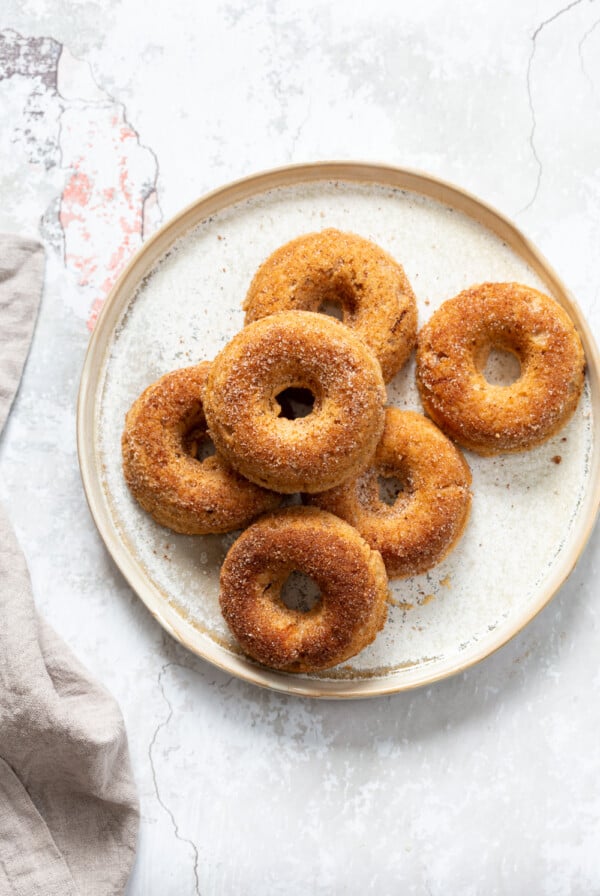 Baked Apple Cider Donuts. These Cider donuts have amazing spiced flavor with concentrated cider. Perfect for fall. #Vegan #Soyfree #Recipe.