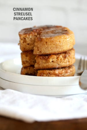These Vegan Cinnamon Streusel Pancakes are a perfect treat for Valentines or a special day. A delicious fluffy vanilla pancake topped with a cinnamon streusel for a coffee cake like pancake. Make the pancakes in cookie cutters to make a cake like pancake tower! #Vegan #Pancakes #Soyfree #Nutfree #Recipe #VeganRicha