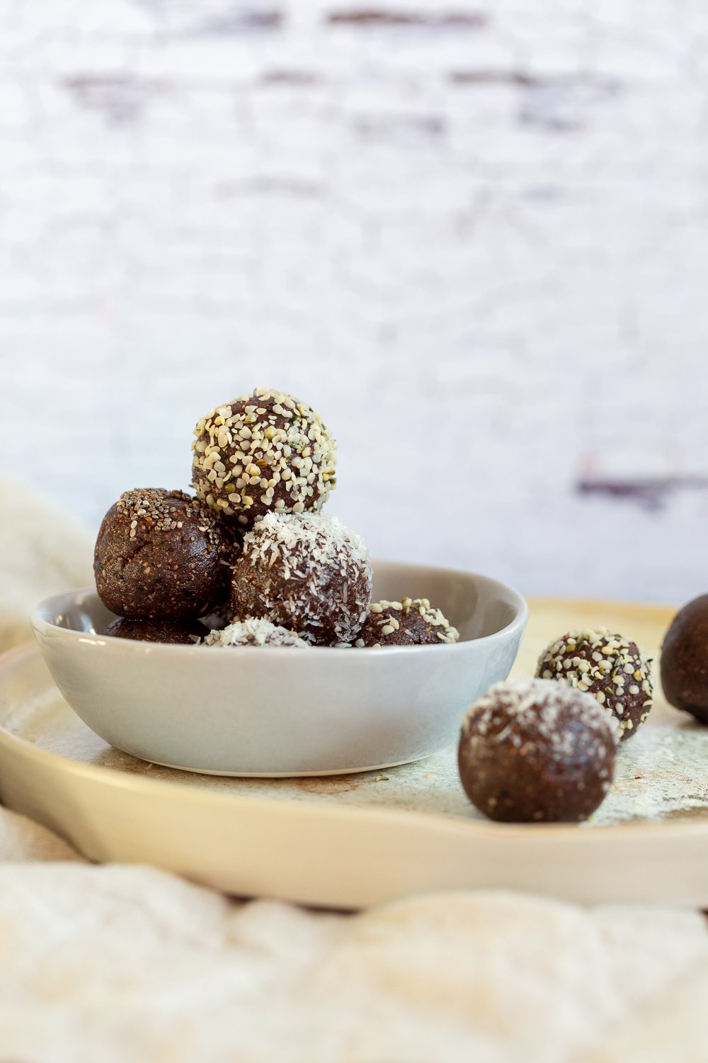 Our Raw Vegan Brownie Bites in grey bowl