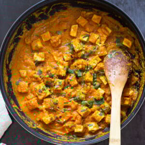 Tofu and Cauliflower in Kohlapuri Sauce in a Black skillet