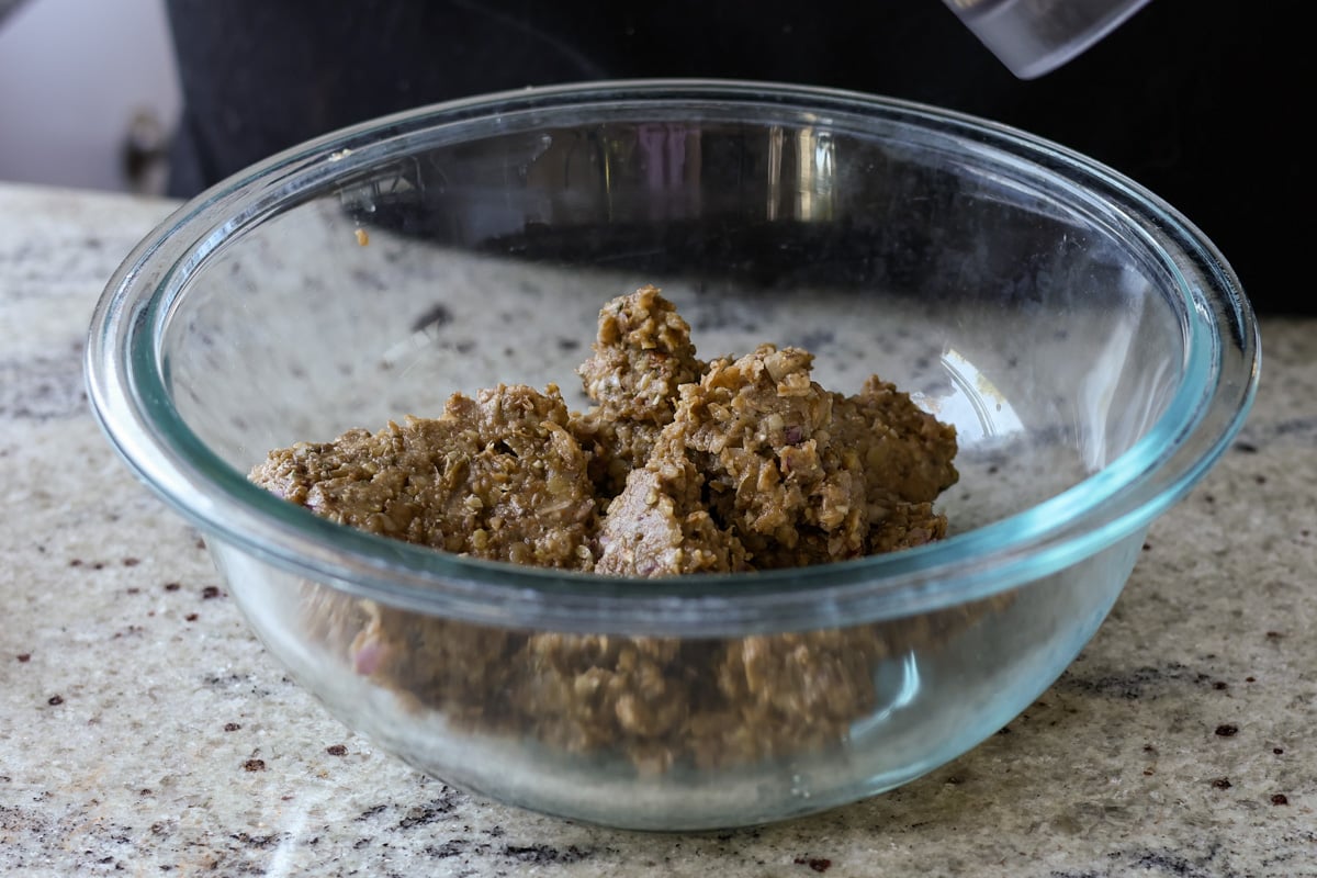 adding whole lentils to the lentil meat mixture