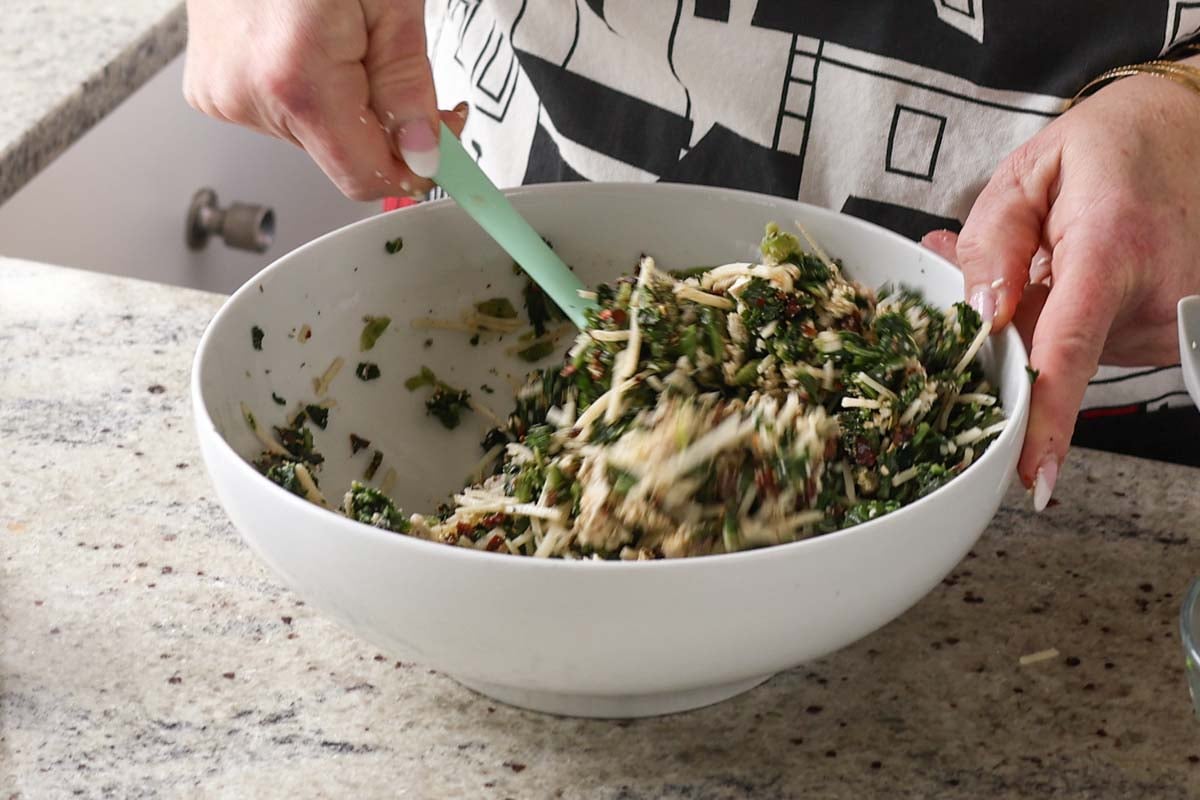 mixing up the tofu spinach filling