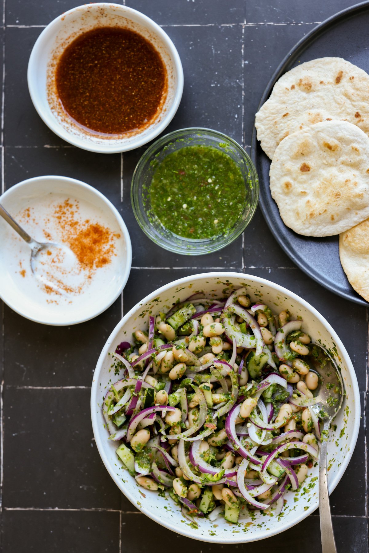all of the chutney bean tostadas components ready to assemble