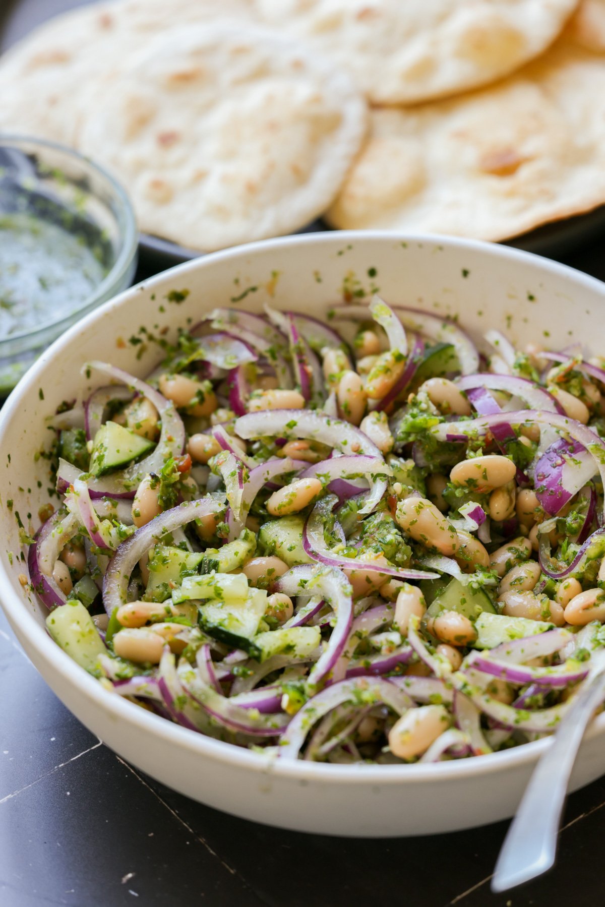 marinating white beans and veggies in green chutney