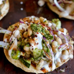 close-up of chutney bean tostadas on the cutting board