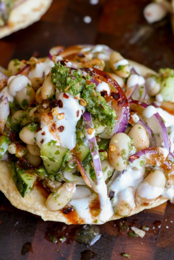 close-up of chutney bean tostadas on the cutting board