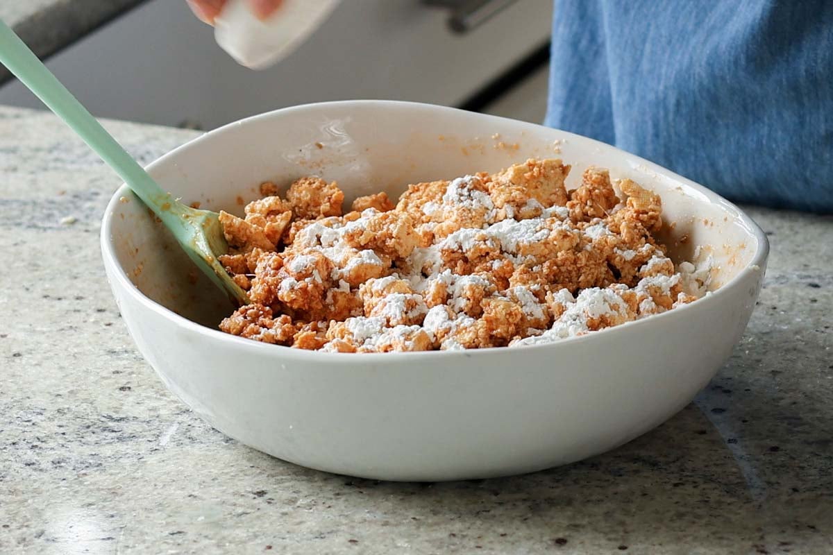 adding cornstarch to the gochujang tofu