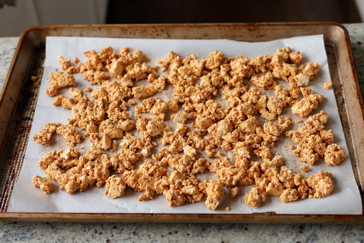 gochujang tofu spread out on the baking sheet