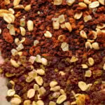 peanut gochujang savory lentil granola on the baking pan after baking