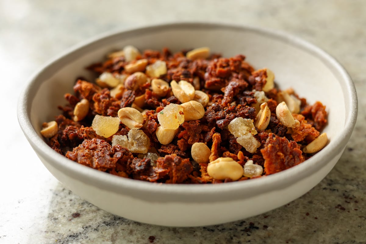 peanut gochujang granola in a bowl