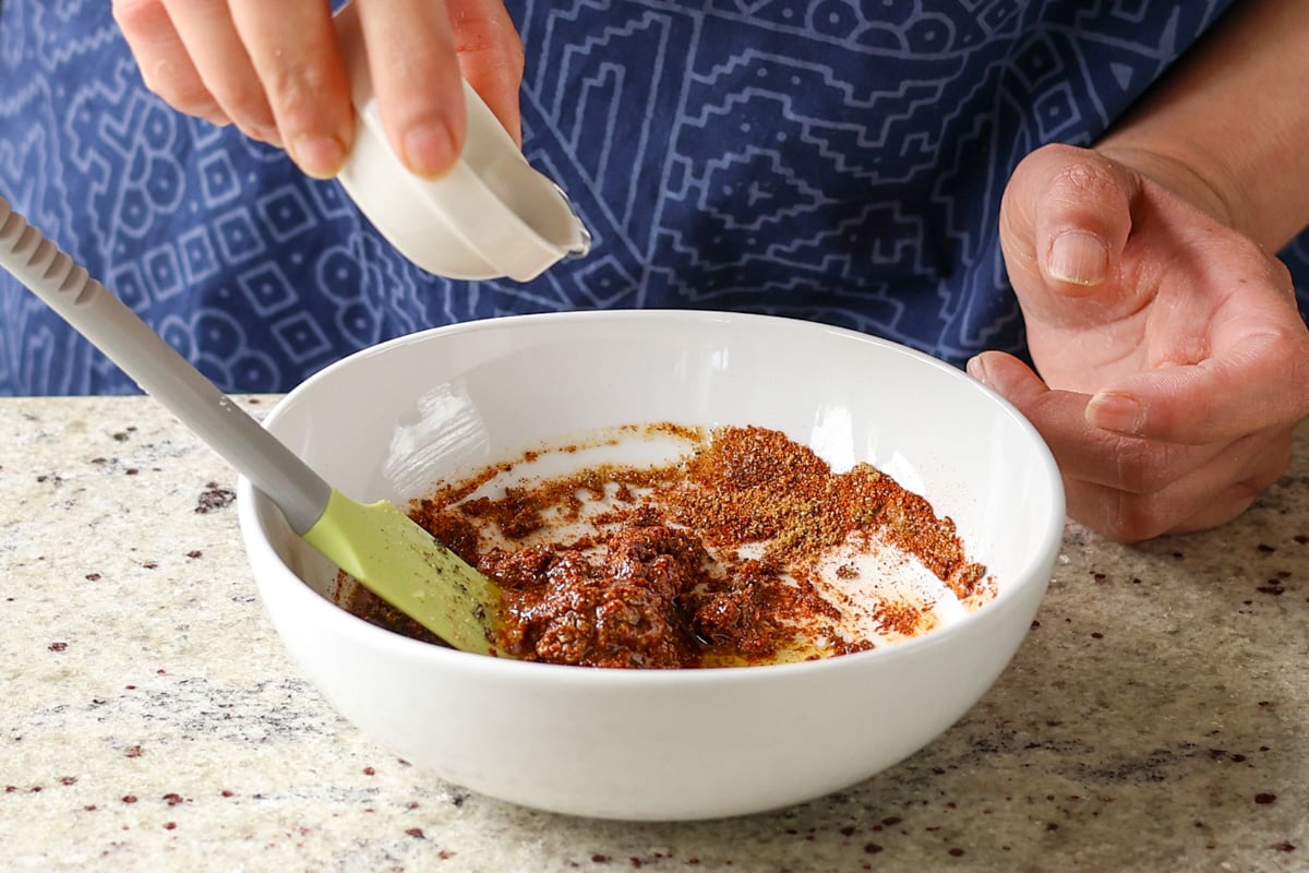 adding the wet ingredients to the spice mixture