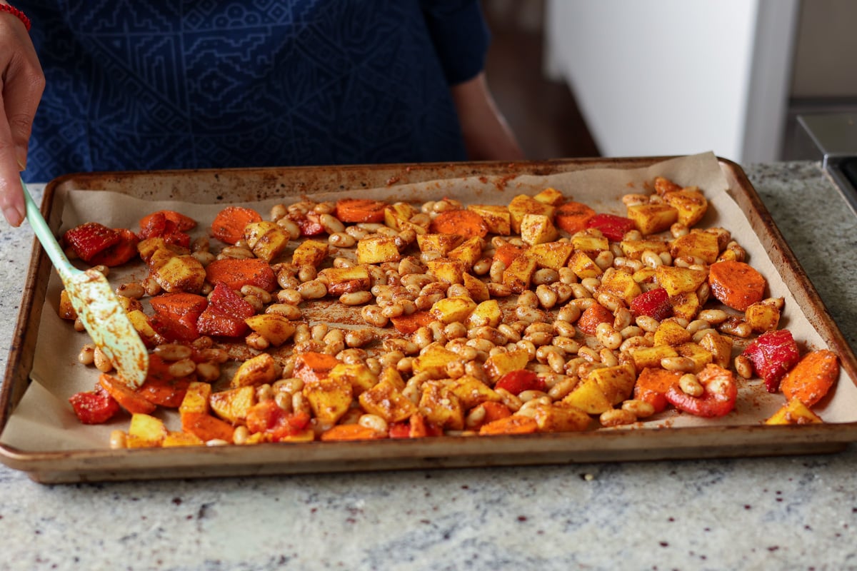 veggies and beans ready to bake on the sheet pan