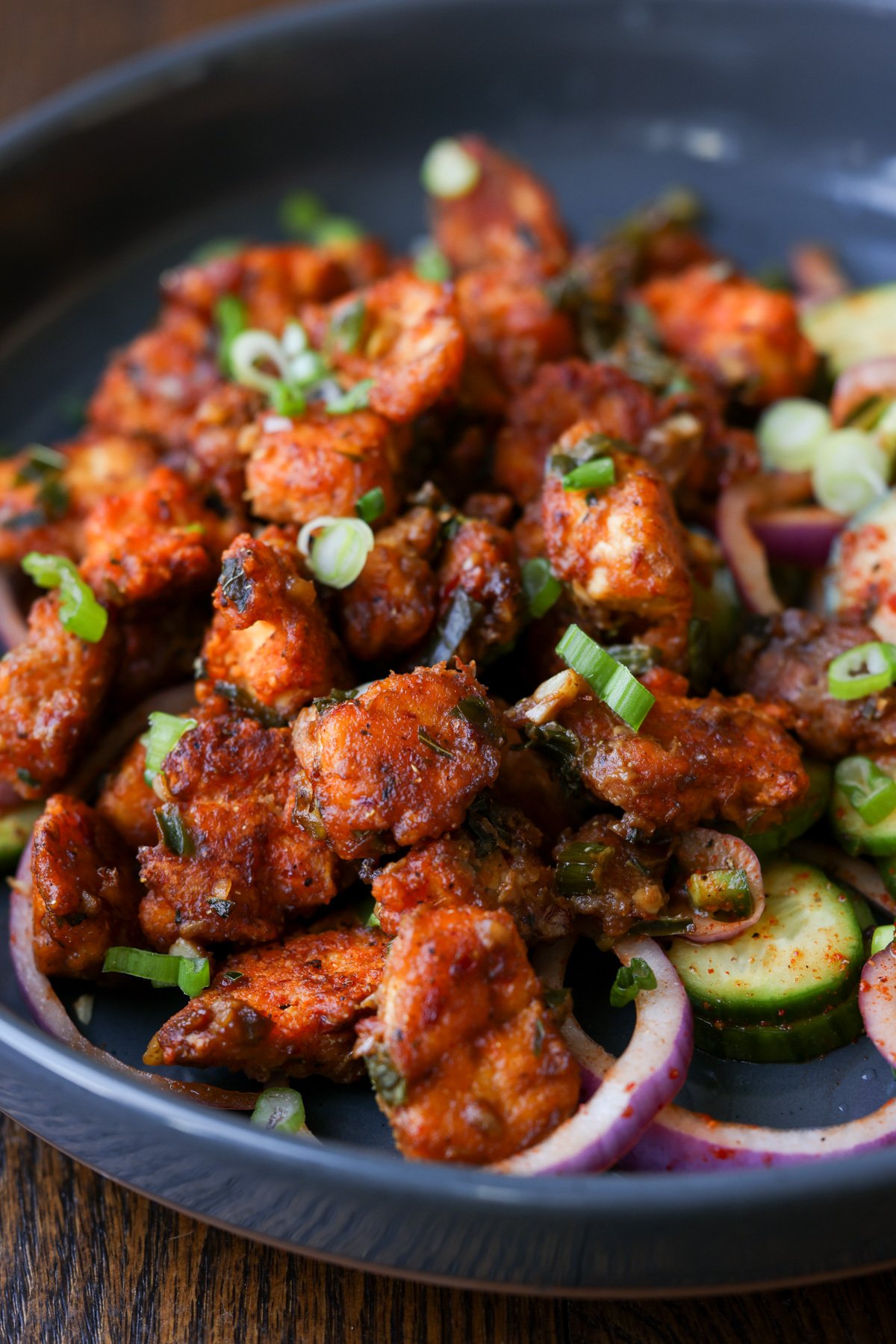 tofu majestic in a bowl with laccha onions