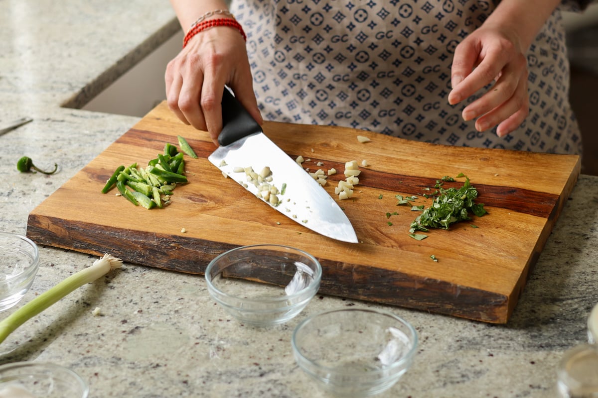 chopping the herbs