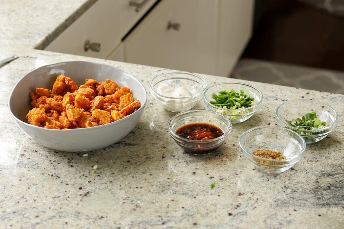 tofu majestic on the counter next to the sauce ingredients