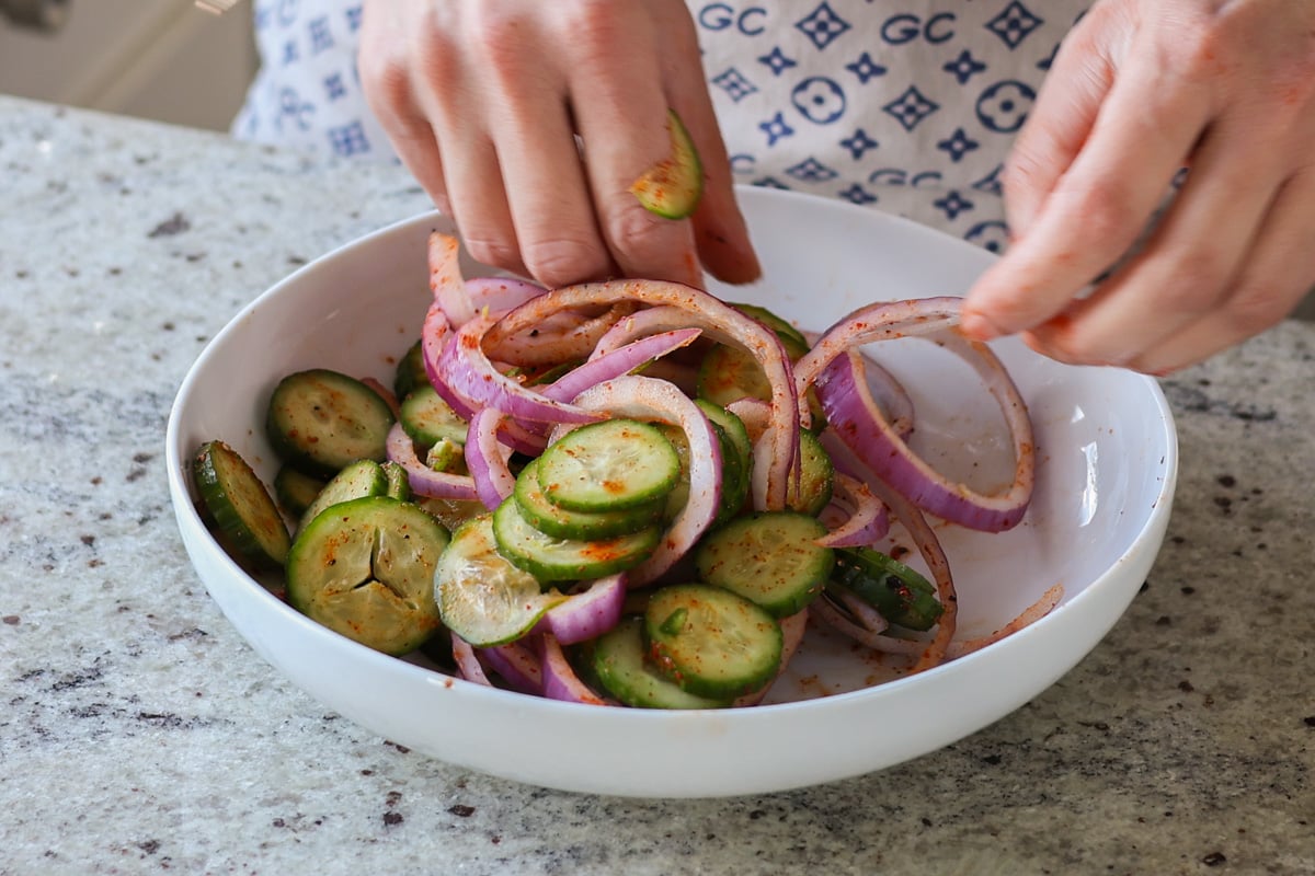 tossing veggies in the spices