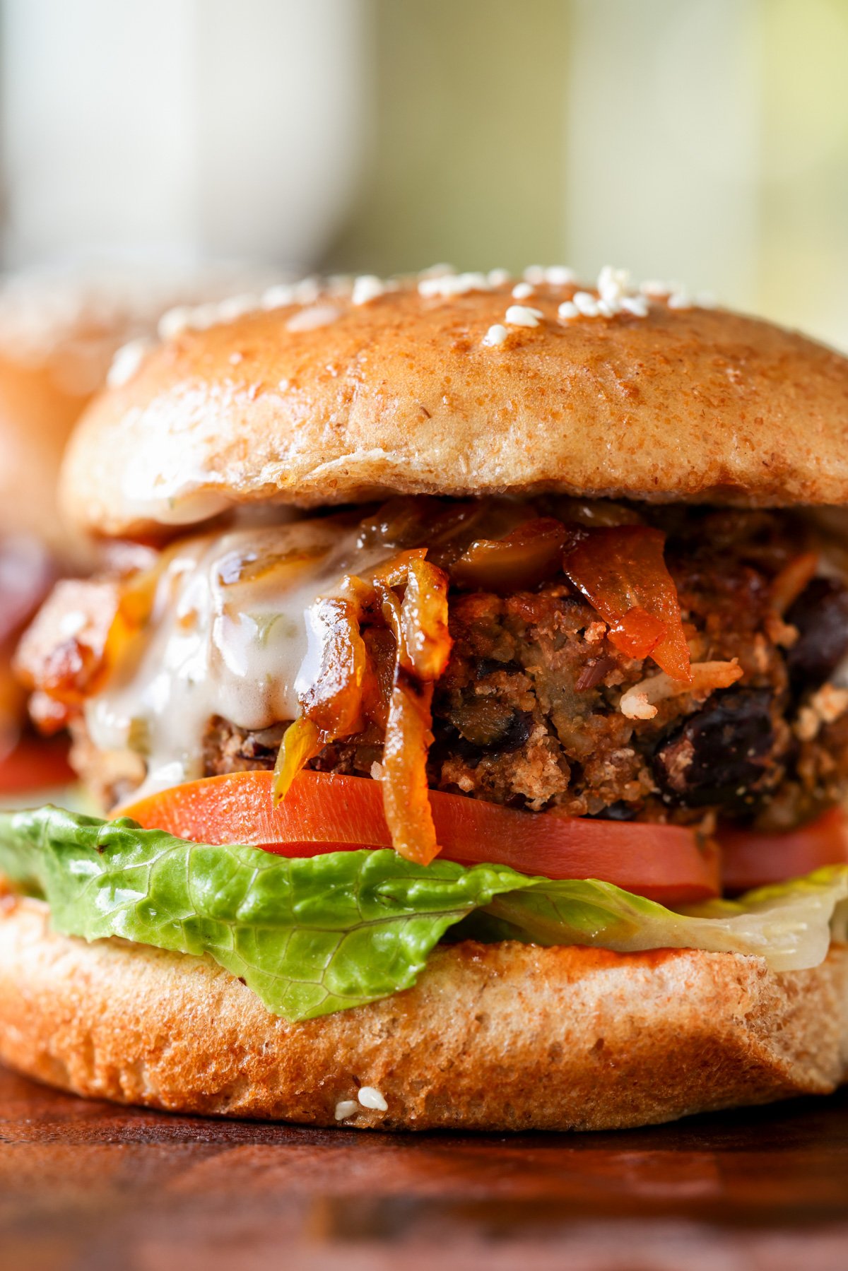 Grillable veggie burger, sunflower seed burger with caramelized onion.