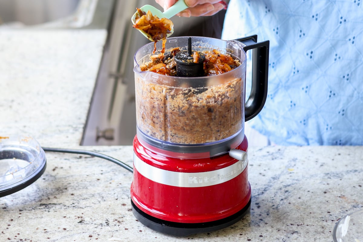 Caramelized onions added to the veggie burger mix in a food processor.