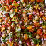 close-up of mango chickpea salad in a serving bowl