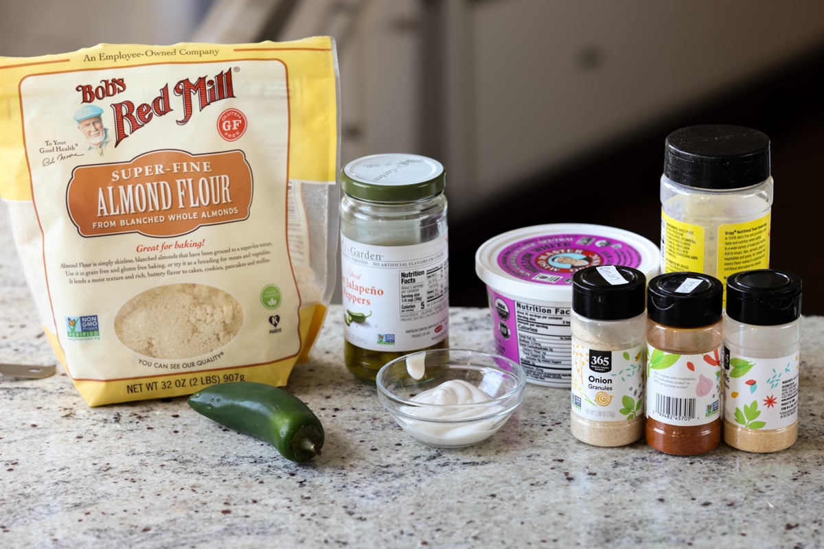 jalapeno popper cheese ball ingredients on the kitchen counter