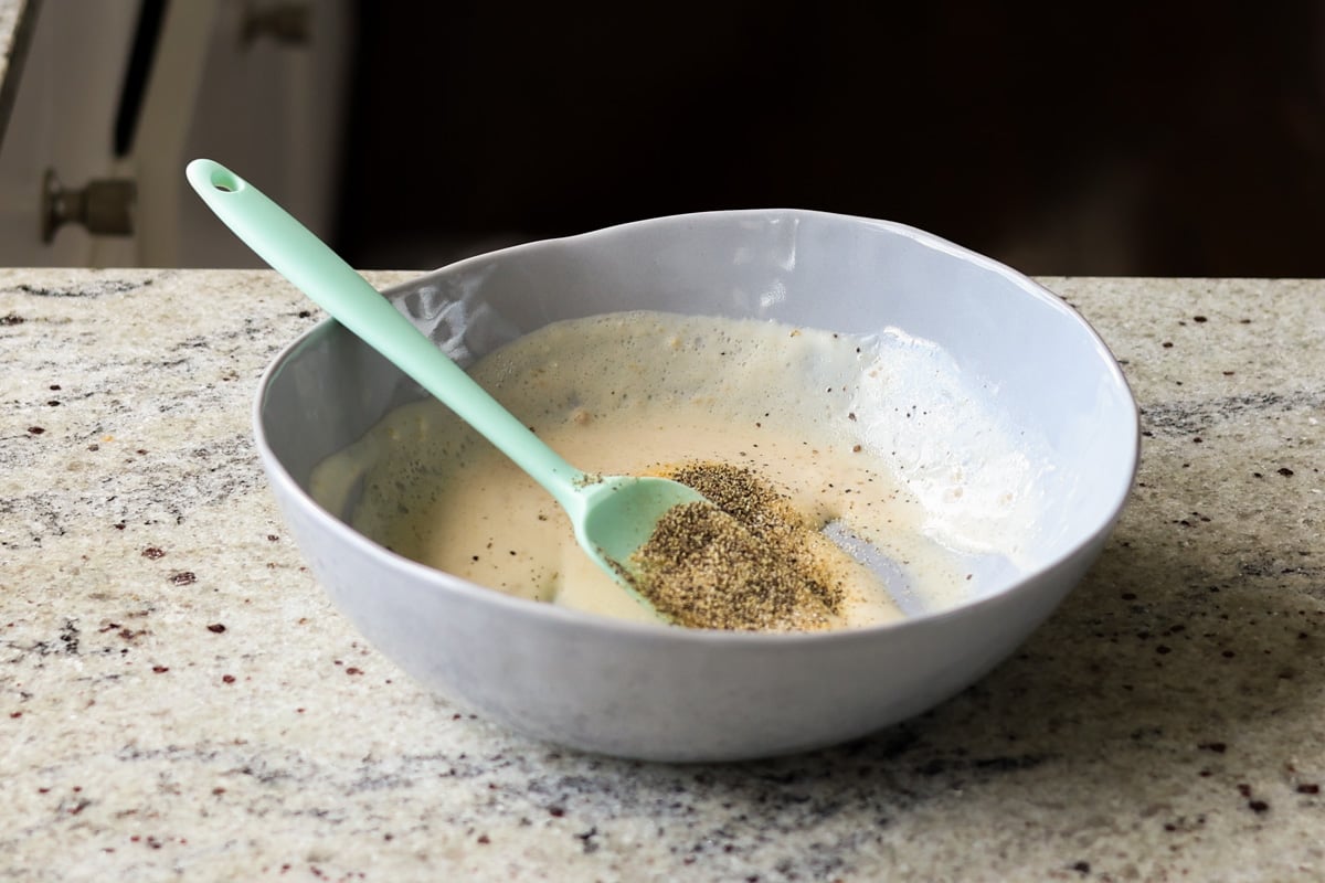 adding the spices to the bowl