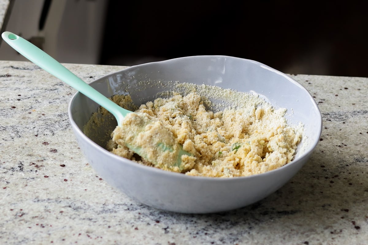 mixing the jalapeno popper cheese ball dough