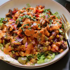 cajun sheet pan beans veggies in a bowl