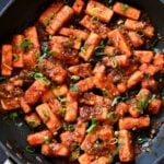 tofu Manchurian in the pan after coating the tofu in the sauce