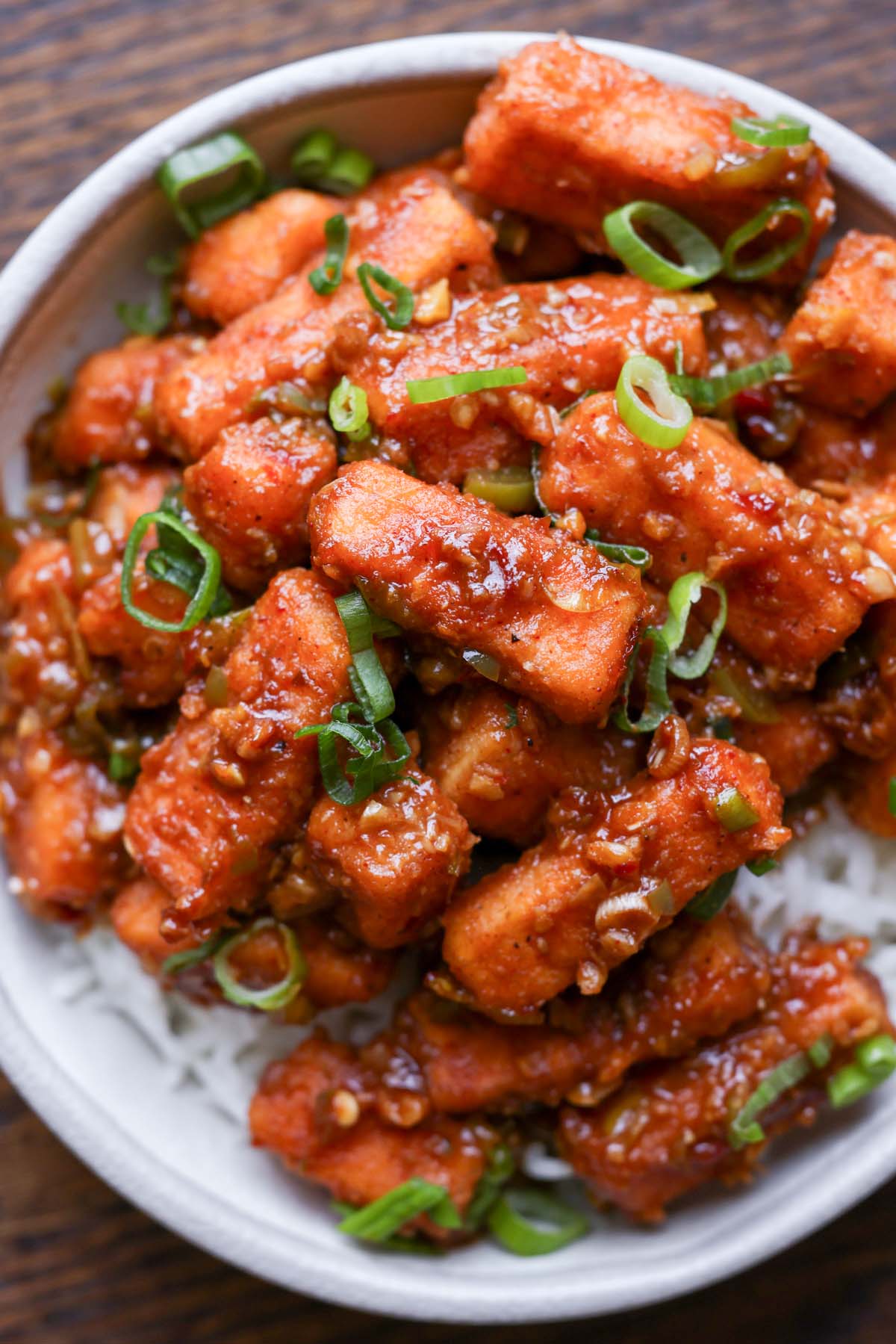close-up of tofu Manchurian in a bowl with rice
