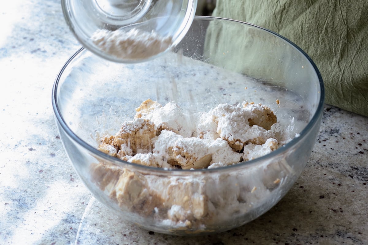 adding the cornstarch mixture to the tofu