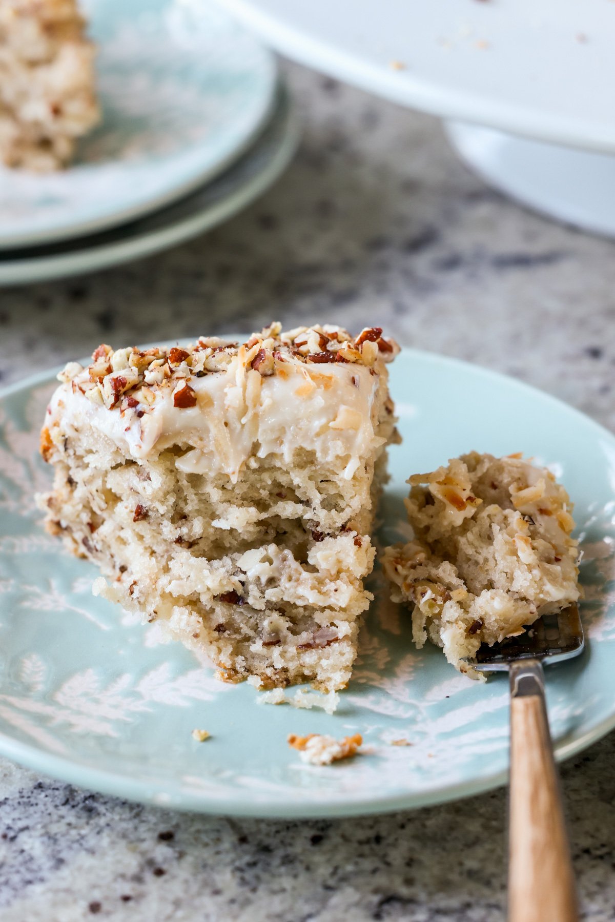 slice of Italian wedding cake with a bite taken out