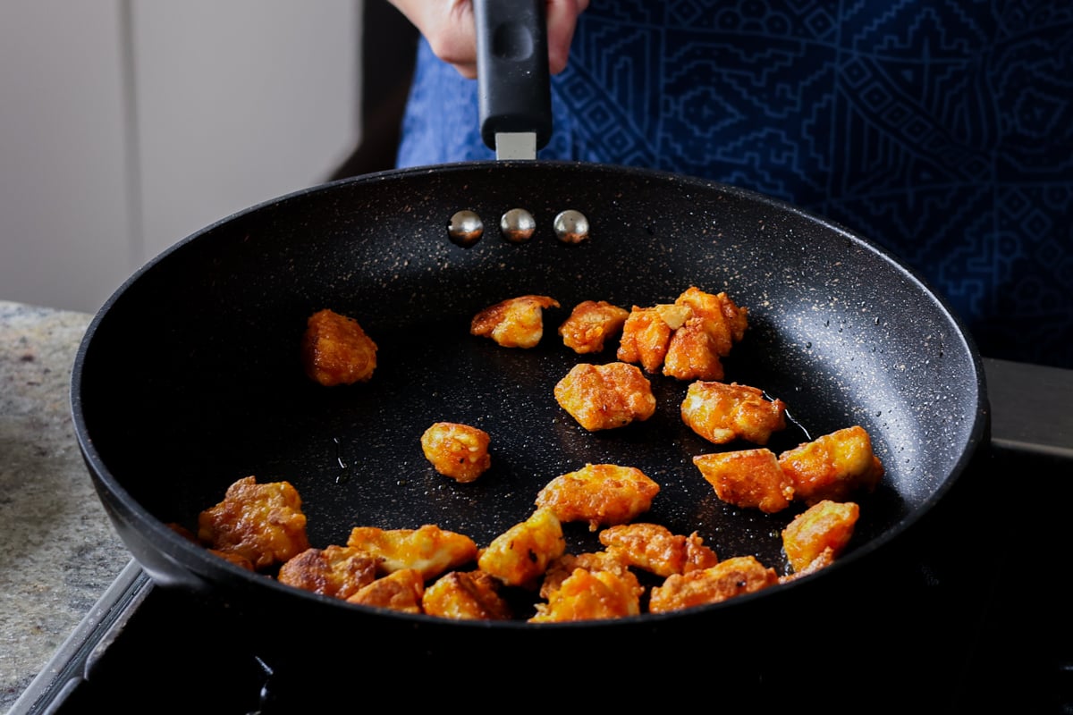 crispy tofu in the pan after cooking