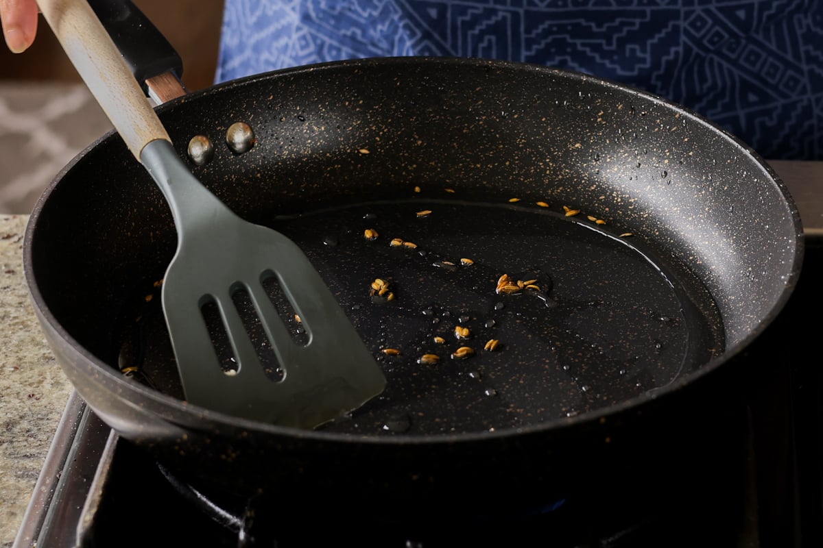 roasting the whole spices in the pan
