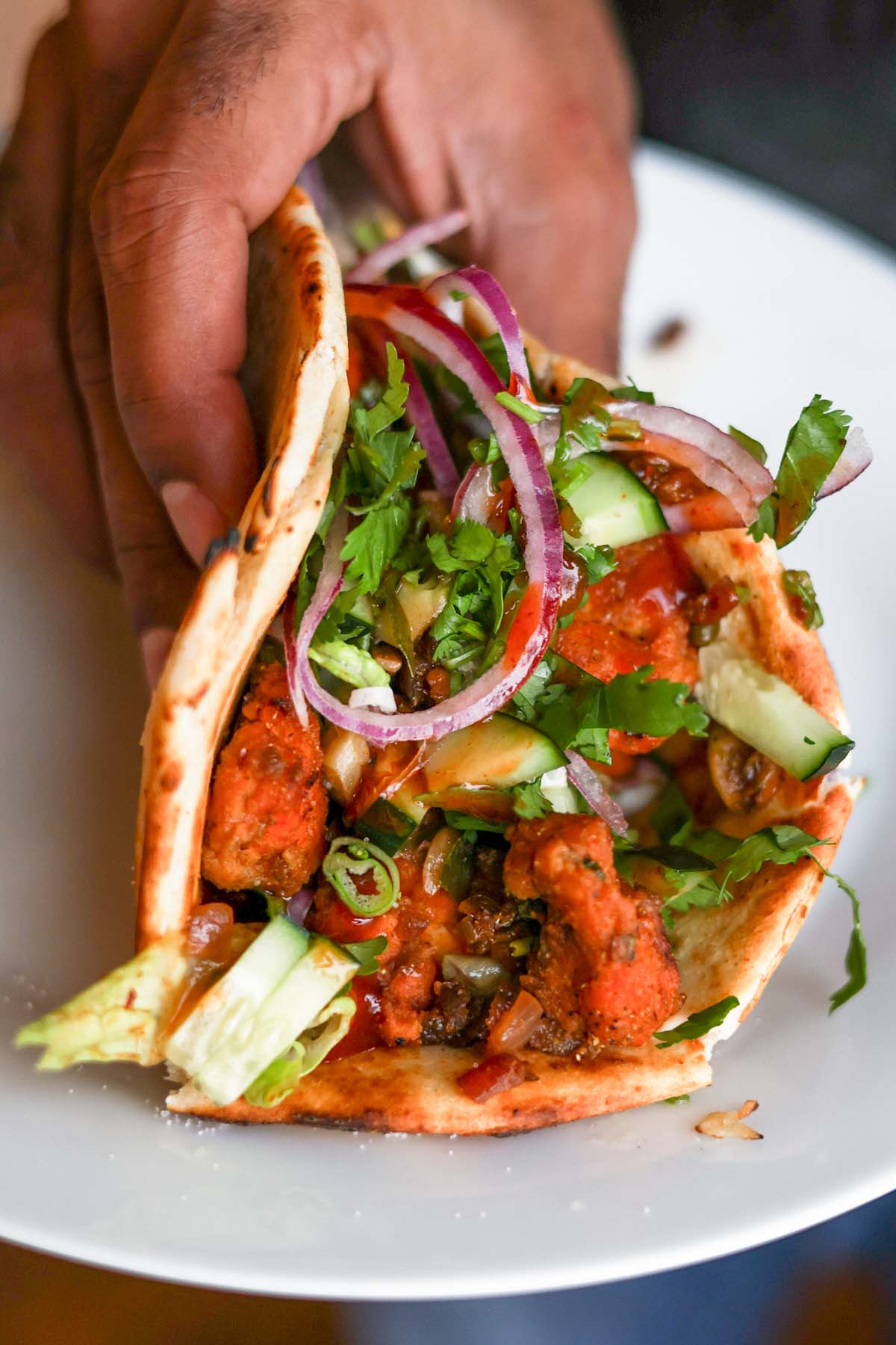 wrap made with veggies and vegan chicken 555