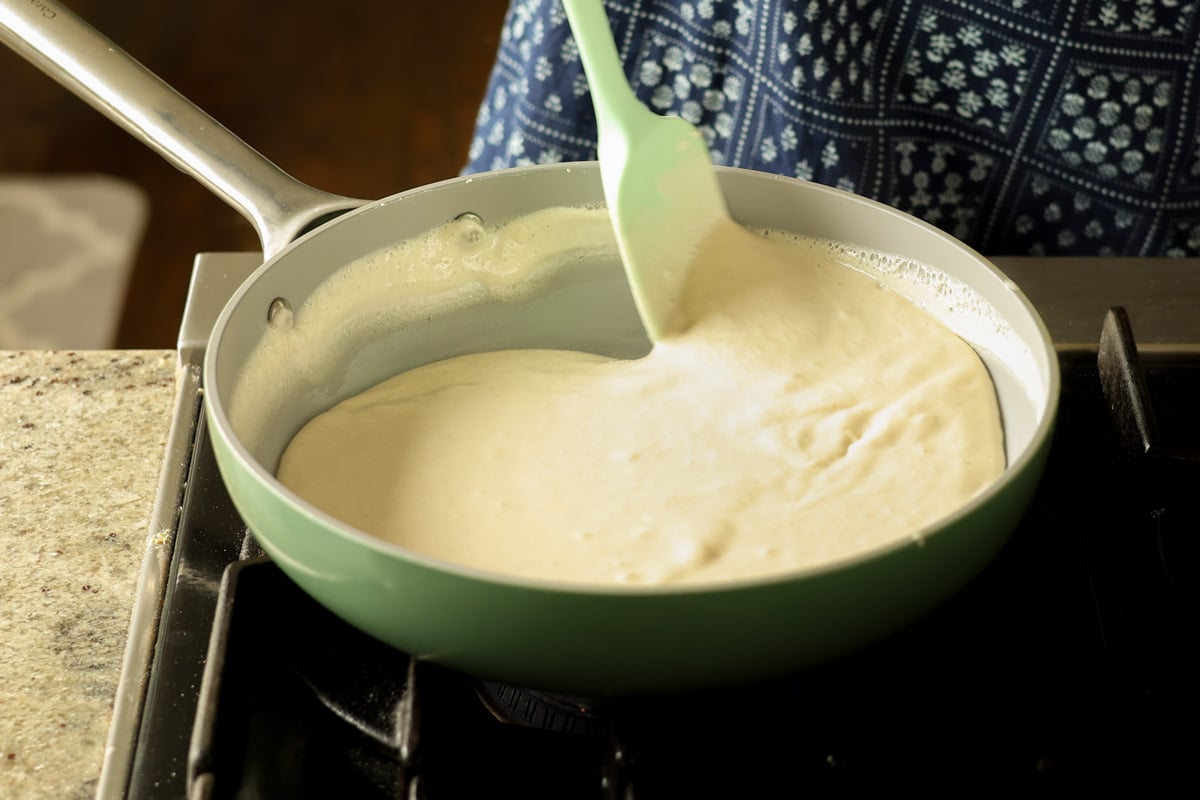 thickened cardamom cream in the pan