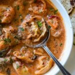 close-up of a bowl of tortellini soup