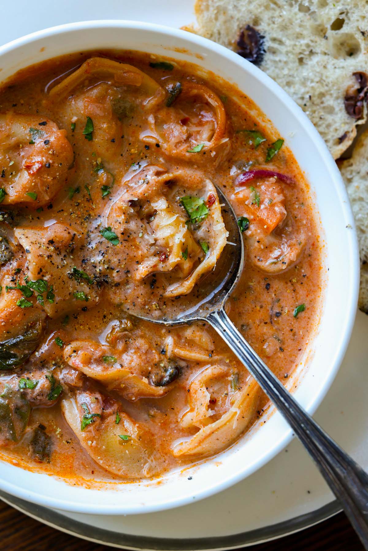 close-up of a bowl of tortellini soup