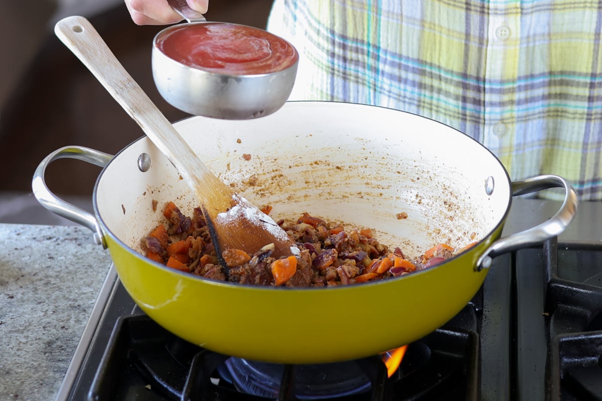 adding the tomato puree